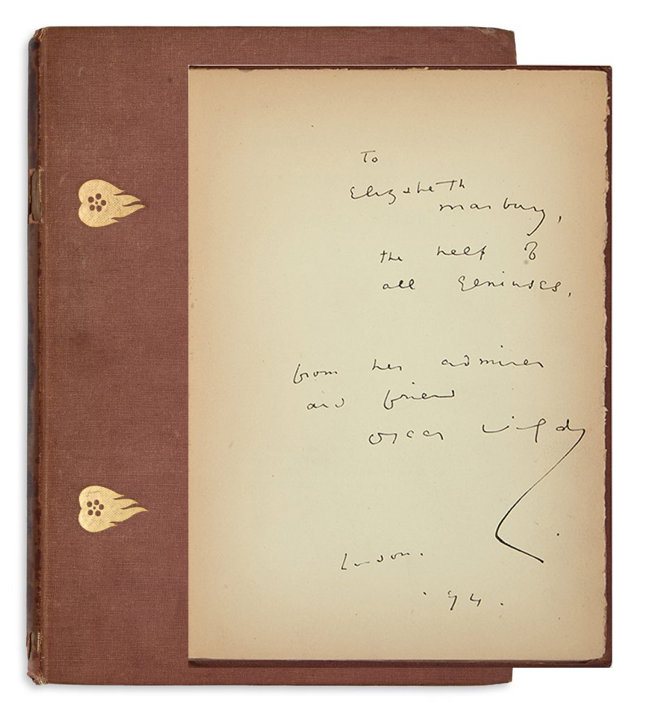 Oscar Wilde's Lady Windermere's Fan shown with the front cover and inscription and signature.
